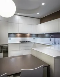 Modern corner kitchen design in light colors photo