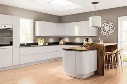 Modern corner kitchen design in light colors photo