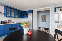 Blue color of the walls in the kitchen in the interior