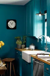 Blue color of the walls in the kitchen in the interior