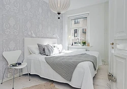 Bedroom interior design with white wallpaper