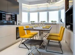 Kitchen with yellow chairs photo