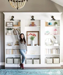 How to decorate a shelving unit in the living room interior photo