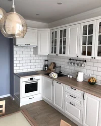 Sink and stove next to each other in the kitchen photo