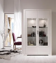 Cabinet In The Living Room For Dishes With Glass In A Modern Style Photo