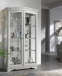 Cabinet in the living room for dishes with glass in a modern style photo