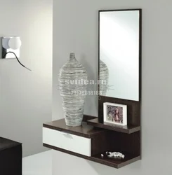 Mirror with hanging cabinet in the hallway photo