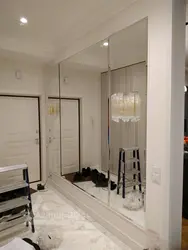 Large mirror in the hallway on the entire wall photo