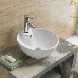 Sink bowl on the countertop in the bathroom photo