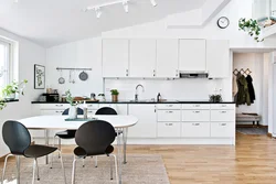 White kitchen black appliances photo wooden countertop