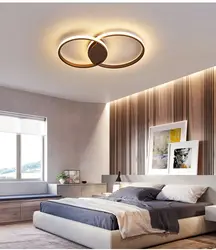 Modern chandelier under a suspended ceiling in the bedroom photo