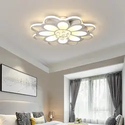 Modern Chandelier Under A Suspended Ceiling In The Bedroom Photo