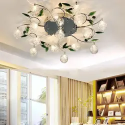 Modern chandelier under a suspended ceiling in the bedroom photo