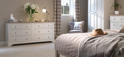 Chests of drawers wardrobes in the bedroom interior photo