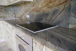 Countertop made of artificial marble for the kitchen photo