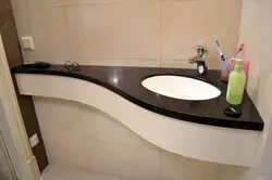 Countertop Made Of Artificial Stone In The Bathroom Design