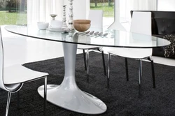Table on one leg in the kitchen interior
