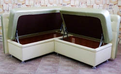 Тартпалары бар ас үйге арналған бұрыштық диван фотосуреті