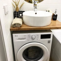 Bathroom Design With A Sink Above The Washing Machine Photo
