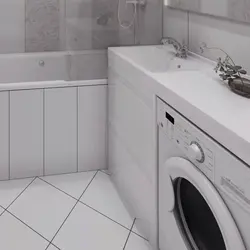 Paltaryuyan maşın fotoşəkilinin üstündə bir lavabo ilə vanna otağı dizaynı