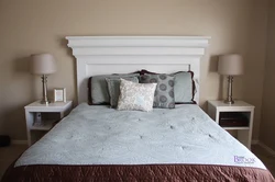 How to decorate the headboard of a bed in the bedroom with your own photos