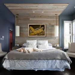 Modern bedroom interior with laminate flooring on the wall