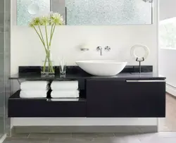 Bath cabinet with countertop sink photo