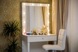 Illuminated mirror in the bedroom interior