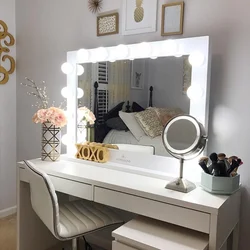 Illuminated mirror in the bedroom interior