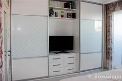 Photo of bedroom cabinets with TV photo
