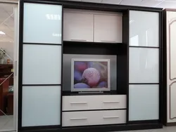 Photo of bedroom cabinets with TV photo