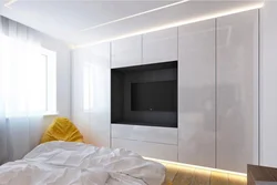 Photo of bedroom cabinets with TV photo