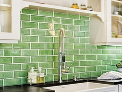 Kitchen with green tile splashback design