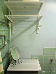 Drying clothes in bathroom photo