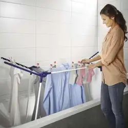 Drying clothes in bathroom photo
