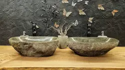 Танӯраи санг дар акси ванна