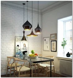 Sconce for the kitchen on the wall above the table photo