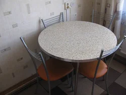 Round table photo in the kitchen in Khrushchev photo