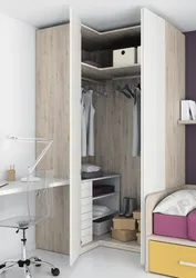 Small bedroom design with corner wardrobe