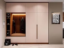 Wardrobe with open hanger in the hallway photo