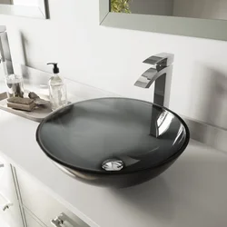 Black sink in the bathroom in the interior