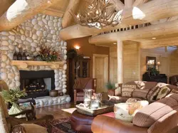 Fireplace in the living room of a wooden house photo