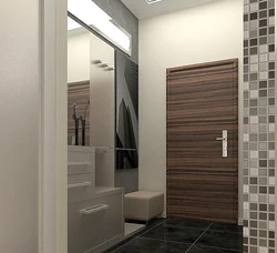 Hallway with a mirror opposite the door photo