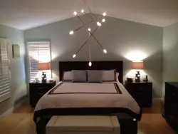 Light above the bed in the bedroom photo
