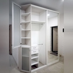 Sloping wardrobe in the hallway photo in modern