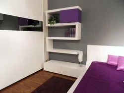 Shelves on the wall in the bedroom interior