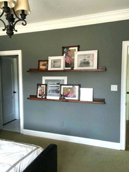 Shelves on the wall in the bedroom interior