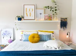 Shelves on the wall in the bedroom interior