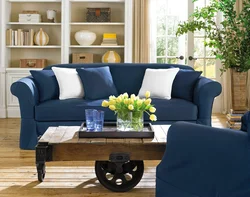 Living room interior with green and blue sofa