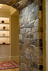Decorative stone in the interior of the hallway with your own